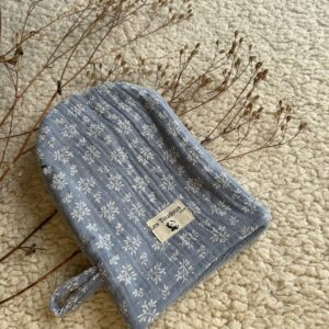 gant de toilette bleu motif feuilles blanches