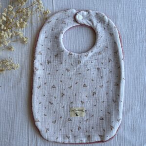 Bavoir rose motifs noisettes